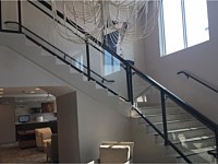 <b>Interior Stair and Balcony Glass Panel Aluminum Railing at the Fairfield in Ocean City, MD</b>